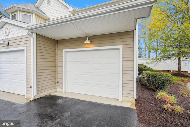 garage with driveway