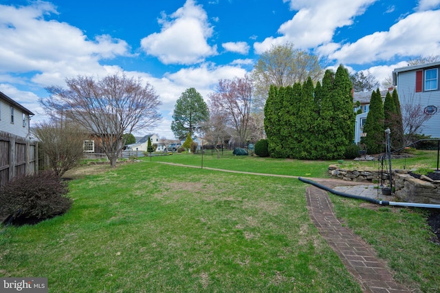view of yard with fence