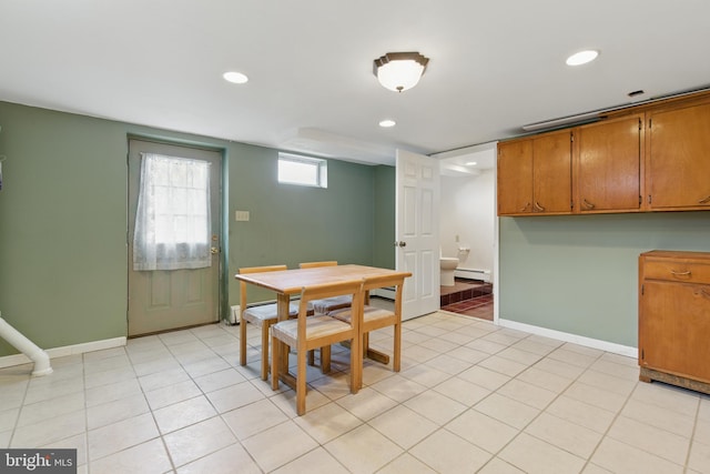 dining room with a baseboard heating unit, baseboards, light tile patterned floors, and recessed lighting