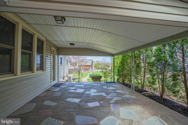 view of patio featuring a carport
