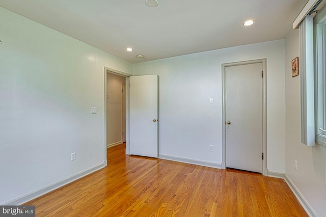 3820 Lorcom Ln, Arlington, VA 22207 - unfurnished bedroom featuring light wood finished floors, baseboards, and recessed lighting