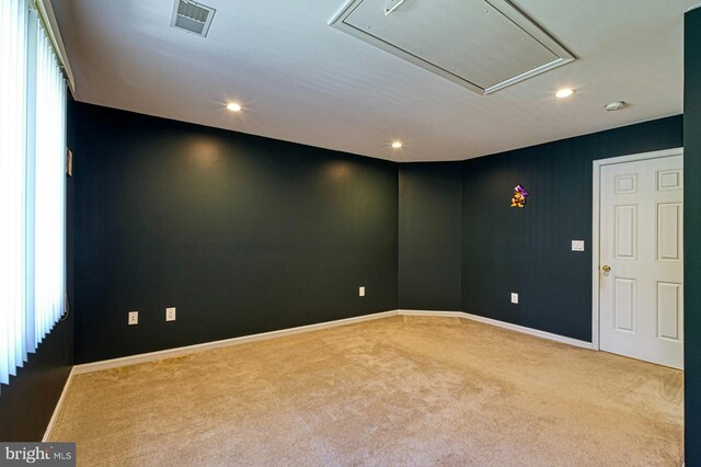 3820 Lorcom Ln, Arlington, VA 22207 - unfurnished room featuring attic access, baseboards, visible vents, and carpet floors