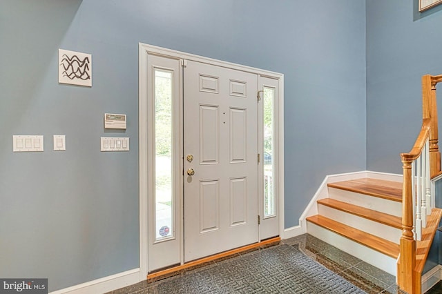 3820 Lorcom Ln, Arlington, VA 22207 - foyer entrance with baseboards, stairs, and a wealth of natural light