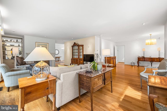 living area featuring light wood-style flooring