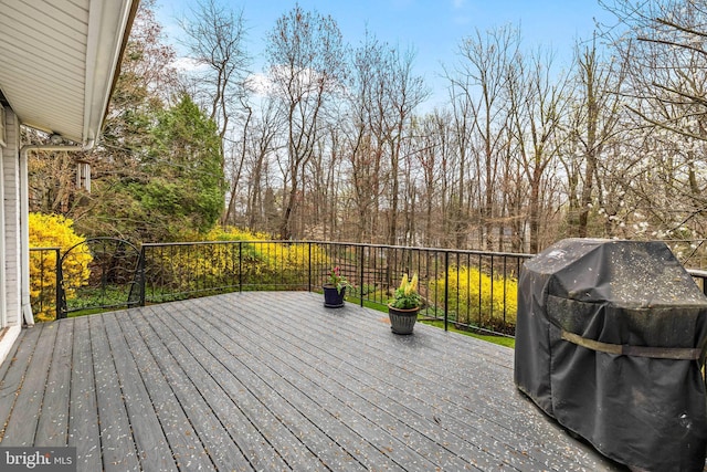 wooden terrace with grilling area