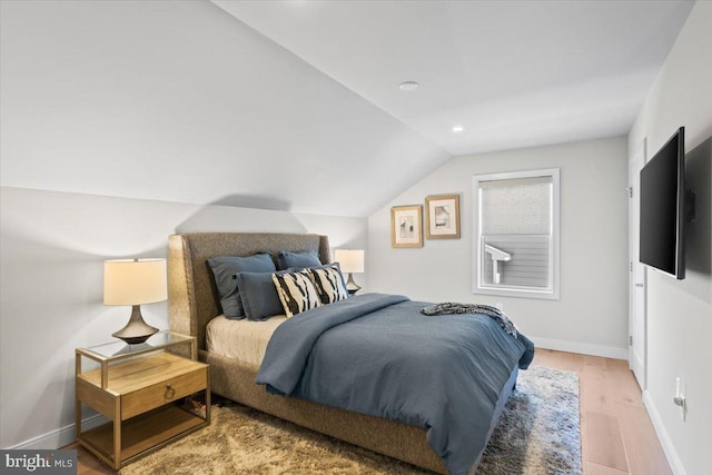 1205 Mosaic Dr, Lebanon, PA 17042 - bedroom with light wood-style flooring, recessed lighting, baseboards, and lofted ceiling