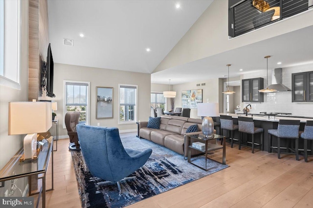 1205 Mosaic Dr, Lebanon, PA 17042 - living room with high vaulted ceiling, recessed lighting, light wood finished floors, and visible vents