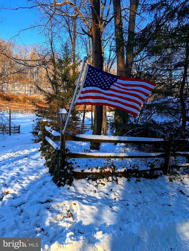 view of community featuring fence