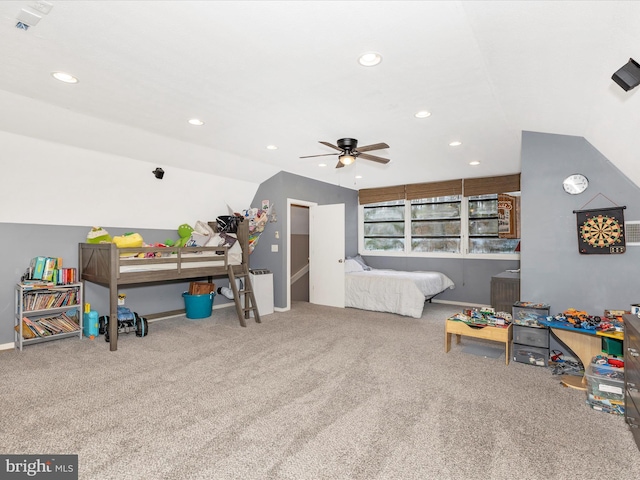 carpeted bedroom with recessed lighting, vaulted ceiling, and baseboards