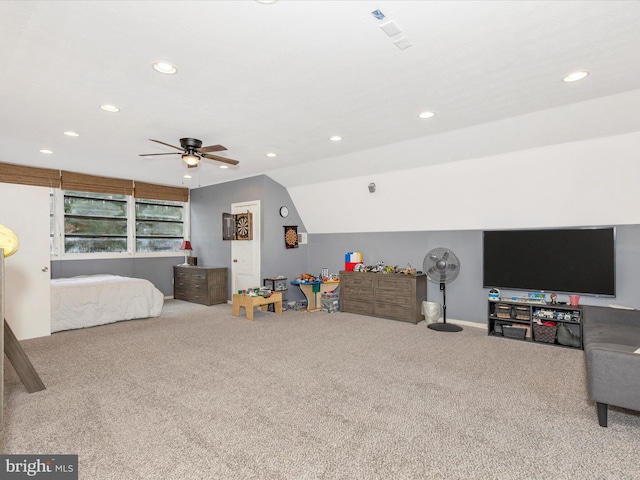 bedroom featuring vaulted ceiling, carpet, recessed lighting, and a ceiling fan