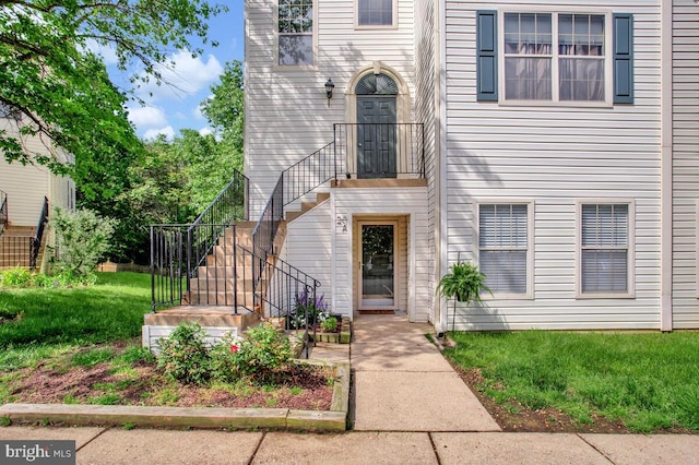 view of front of house with stairs