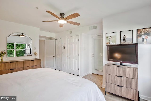 bedroom with baseboards and a ceiling fan