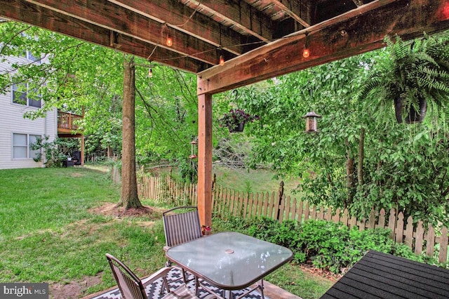 view of yard with outdoor dining space