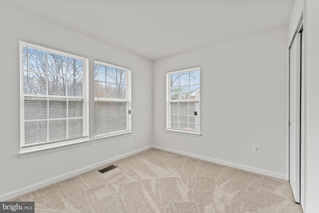 6319 Seton Ridge Dr, Baltimore, MD 21207 - carpeted empty room with visible vents and baseboards