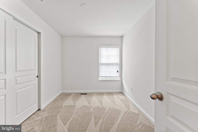 6319 Seton Ridge Dr, Baltimore, MD 21207 - unfurnished bedroom with carpet floors and baseboards