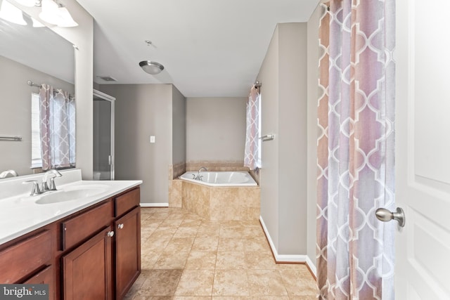 6319 Seton Ridge Dr, Baltimore, MD 21207 - bathroom featuring a bath, vanity, baseboards, and tile patterned flooring