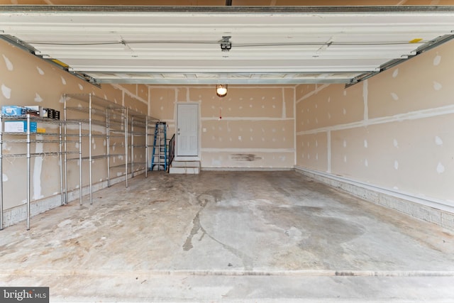 6319 Seton Ridge Dr, Baltimore, MD 21207 - garage featuring a garage door opener