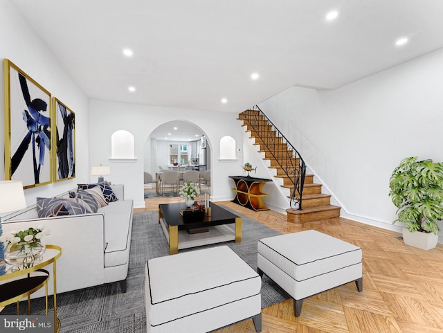 7951 Bayard St, Philadelphia, PA 19150 - living area featuring recessed lighting, arched walkways, baseboards, and stairs