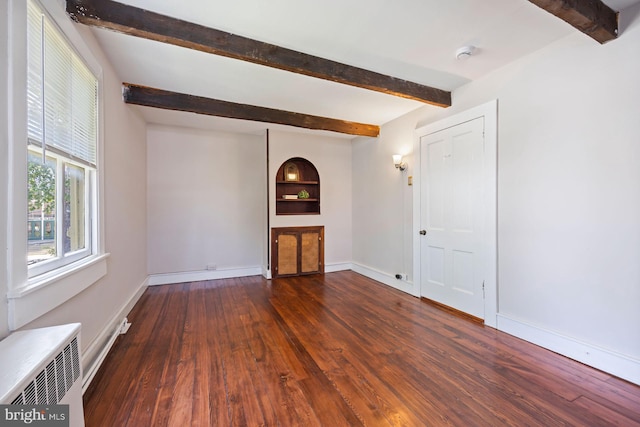 179 Green St, Annapolis, MD 21401 - unfurnished room with beam ceiling, wood finished floors, a smoke detector, baseboards, and built in features