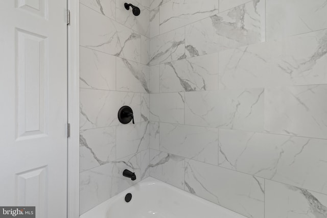 full bath featuring shower / bath combination