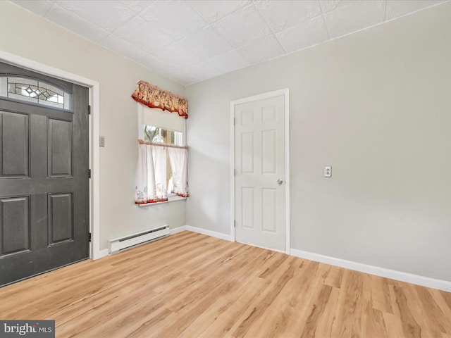 215 Biddle St, Gordon, PA 17936 - entryway featuring baseboards, baseboard heating, and wood finished floors