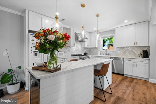kitchen featuring dishwasher, white cabinets, white microwave, wine cooler, and wall chimney exhaust hood