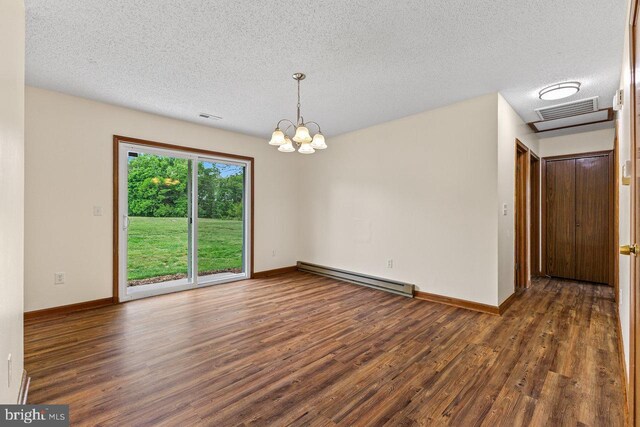 392 Walker Way, Timberville, VA 22853 - spare room with a baseboard heating unit, wood finished floors, a textured ceiling, a chandelier, and baseboards