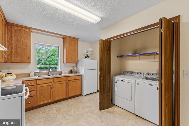 392 Walker Way, Timberville, VA 22853 - laundry area featuring washer and dryer and a textured ceiling
