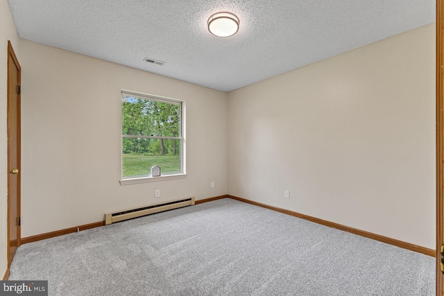 392 Walker Way, Timberville, VA 22853 - spare room featuring a baseboard heating unit, carpet flooring, a textured ceiling, and baseboards
