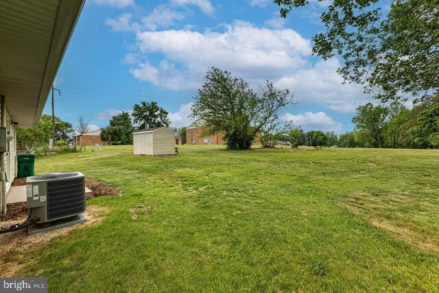392 Walker Way, Timberville, VA 22853 - view of grassy yard featuring cooling unit, a shed, and an outdoor structure