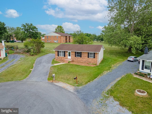 392 Walker Way, Timberville, VA 22853 - view of front of property featuring driveway, brick siding, and a front lawn