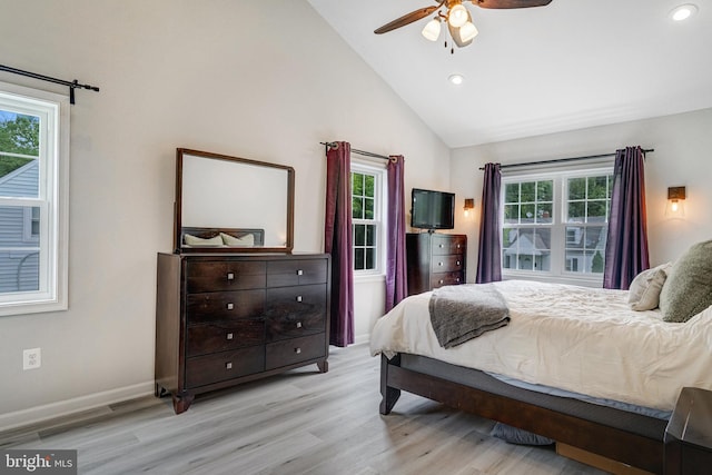 6022 Rixey Dr, Alexandria, VA 22303 - bedroom with multiple windows, wood finished floors, recessed lighting, ceiling fan, and high vaulted ceiling