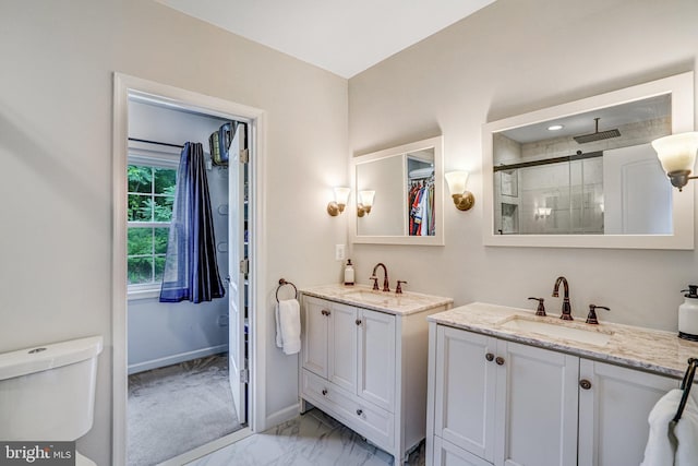 6022 Rixey Dr, Alexandria, VA 22303 - full bathroom with marble look tile flooring, two vanities, and a stall shower