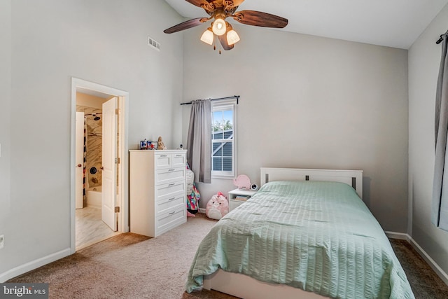 6022 Rixey Dr, Alexandria, VA 22303 - carpeted bedroom featuring high vaulted ceiling, ensuite bathroom, and a ceiling fan