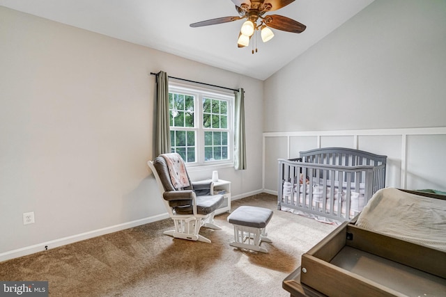 6022 Rixey Dr, Alexandria, VA 22303 - carpeted bedroom featuring lofted ceiling, a crib, and a ceiling fan