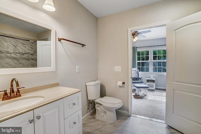 6022 Rixey Dr, Alexandria, VA 22303 - bathroom featuring vanity, a ceiling fan, marble look tile flooring, and a shower