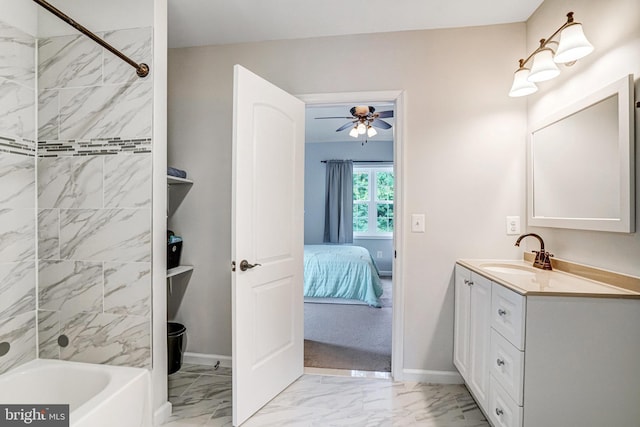 6022 Rixey Dr, Alexandria, VA 22303 - full bathroom with marble look tiles, vanity, shower / bath combination, ceiling fan, and connected bathroom