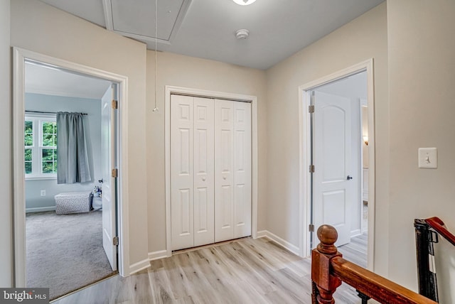 6022 Rixey Dr, Alexandria, VA 22303 - corridor with attic access and light wood finished floors