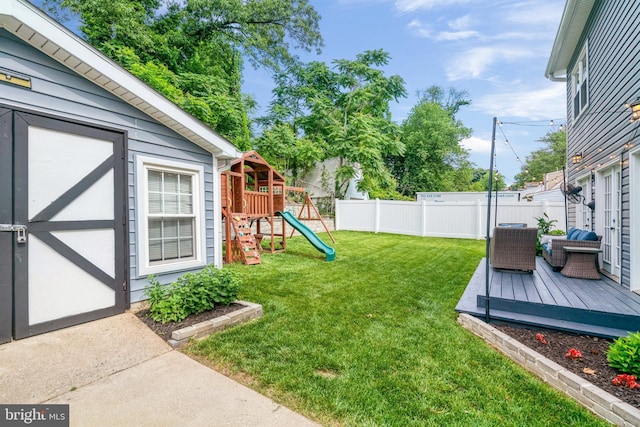 6022 Rixey Dr, Alexandria, VA 22303 - view of yard with a playground and a wooden deck