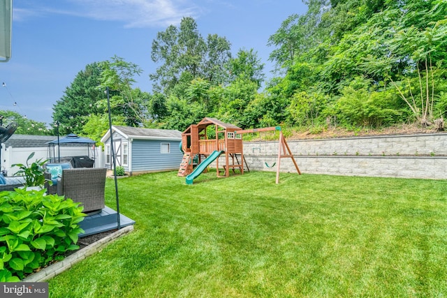6022 Rixey Dr, Alexandria, VA 22303 - fenced backyard featuring a playground, a storage shed, and a gazebo