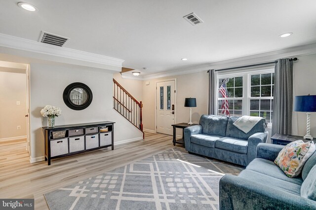 6022 Rixey Dr, Alexandria, VA 22303 - living room with crown molding, stairway, wood finished floors, and recessed lighting