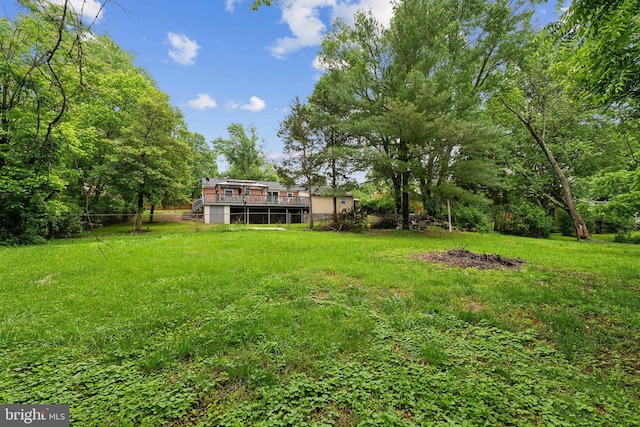 8412 Impalla Dr, Manassas, VA 20110 - view of grassy yard with a deck