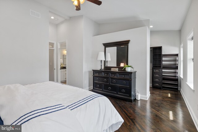 bedroom with wood finished floors, baseboards, visible vents, and multiple windows