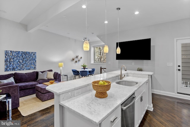 kitchen with white cabinetry, stainless steel dishwasher, a sink, dark wood-style floors, and a center island with sink
