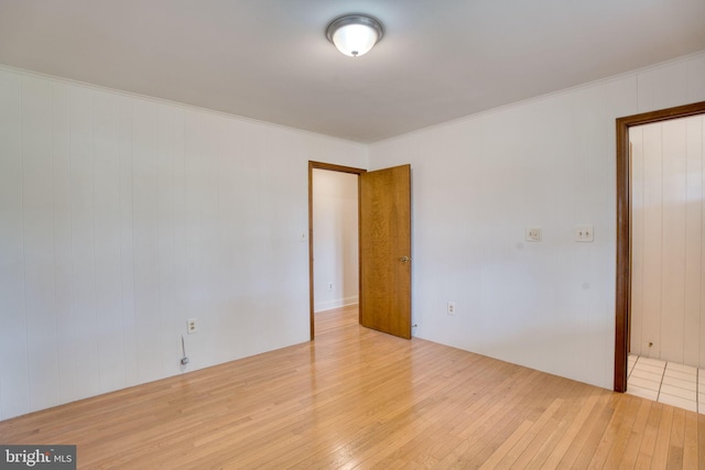 17634 Bruehl Rd, Upperco, MD 21155 - spare room featuring wood-type flooring and crown molding