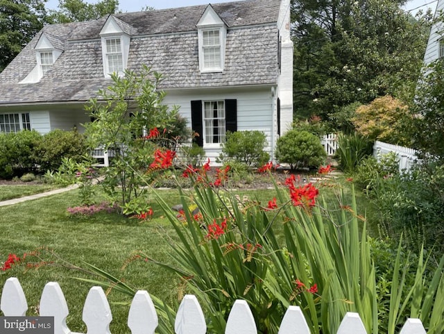 view of front of home featuring a high end roof