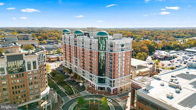birds eye view of property with a view of city