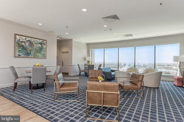 living room featuring visible vents, recessed lighting, baseboards, and ornamental molding