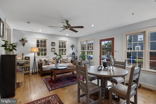 dining space featuring visible vents, light wood-style floors, baseboards, recessed lighting, and a ceiling fan