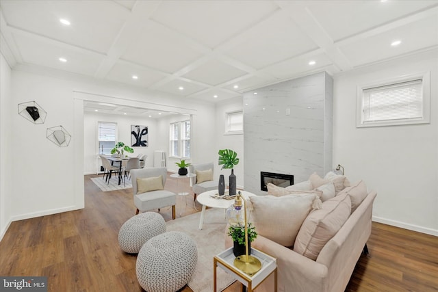 living room with baseboards, recessed lighting, wood finished floors, coffered ceiling, and a premium fireplace